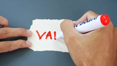 Man writes the word Values ​​on a piece of paper with a red pen Stock Footage 268912457