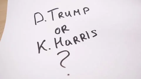 A man writes the words US Elections on a piece of paper Stock Footage 282025953