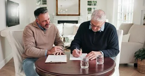 Man, writing and document at house with advisor, finance report and form fo.. Stock Photos