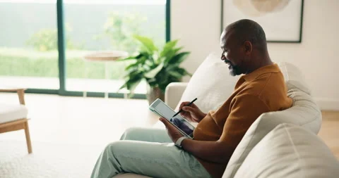 Man, writing and remote work in home with tablet, review proposal and campaign Stock Footage 337756157