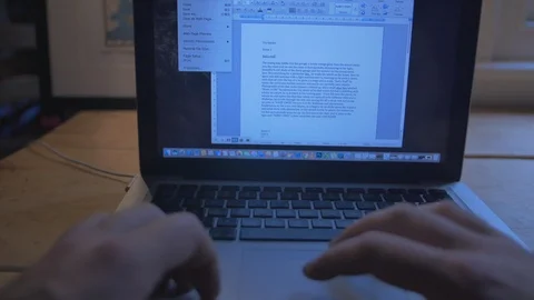 Man writing a book in a coffee shop in first person view  Stock Footage 85653584