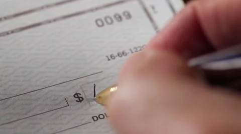 Man writing check Видео 46703979