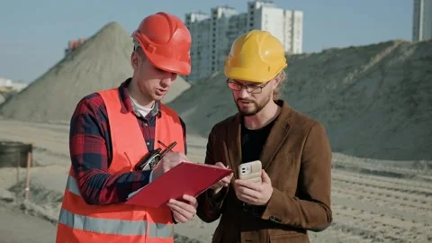 Man writing on documentation, director controlling work process Stock Footage 274408583