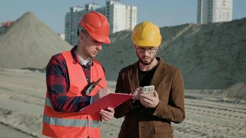 Man writing on documentation, director controlling work process 스톡 사진