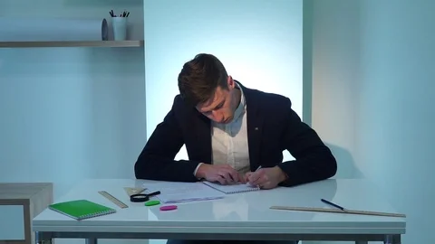 Man writing documents Stock Footage 74379696