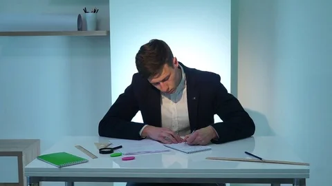 Man writing documents Stock Footage 74698847