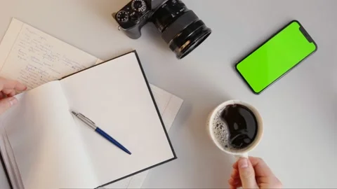 Man Writing, Drinks Coffee then Taps Green Screen Phone in Slowmotion Stock Footage