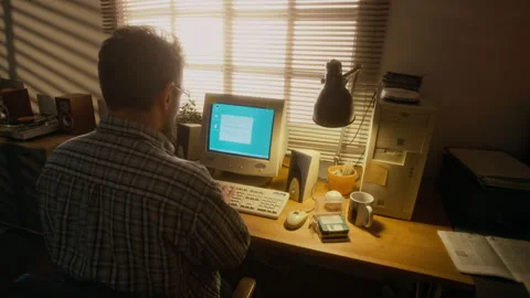 Man Writing Email on Old-Fashioned Desktop Computer in Home Study Stock Footage 327234538