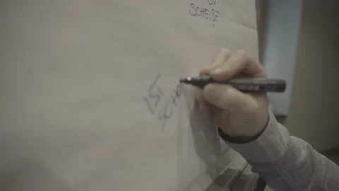 Man writing on a Flipchart Stock Footage 149238104