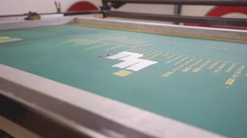 A man is writing on a green surface Stock Footage 302457103