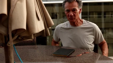 Man Writing in Journal Stock Footage 121586206