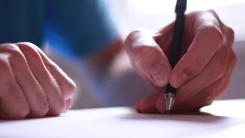 Man writing by left hand closeup 스톡 동영상 82522341