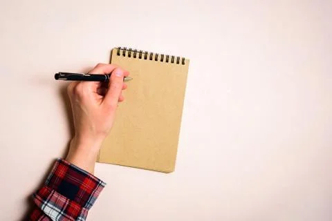 Man writing by left hand Stock Photos