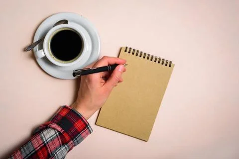 Man writing by left hand Stock Photos