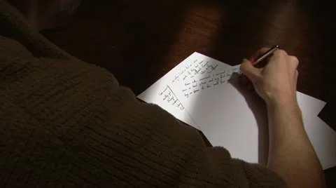 Man writing letter overhead Stock-Footage 11986795