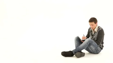 Man Writing In Notebook Stock Footage 52643865