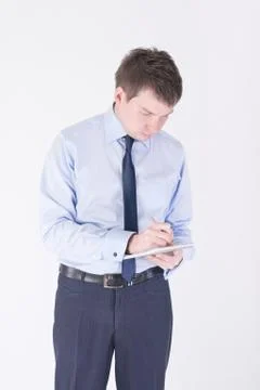 Man writing in a notebook Stock Photos