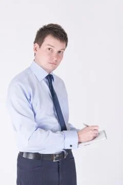 Man writing in a notebook Stock Photos