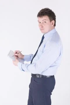 Man writing in a notebook Stock Photos