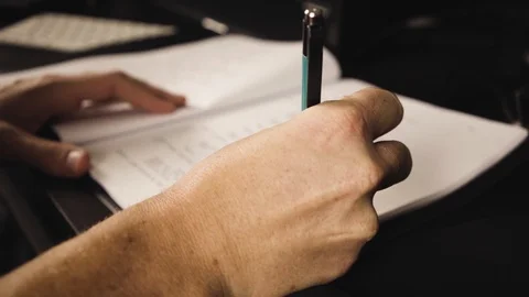 Man Writing In Notebook Slow Motion Stock Footage 101490322