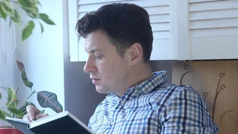 Man Writing Notes On A Diary Stock Footage 124009911