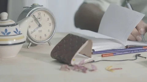 Man Writing Notes Dolly Shot Stockbeeldmateriaal 79918606