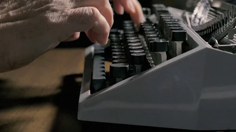 Man writing on an old typewriter. Stock Footage