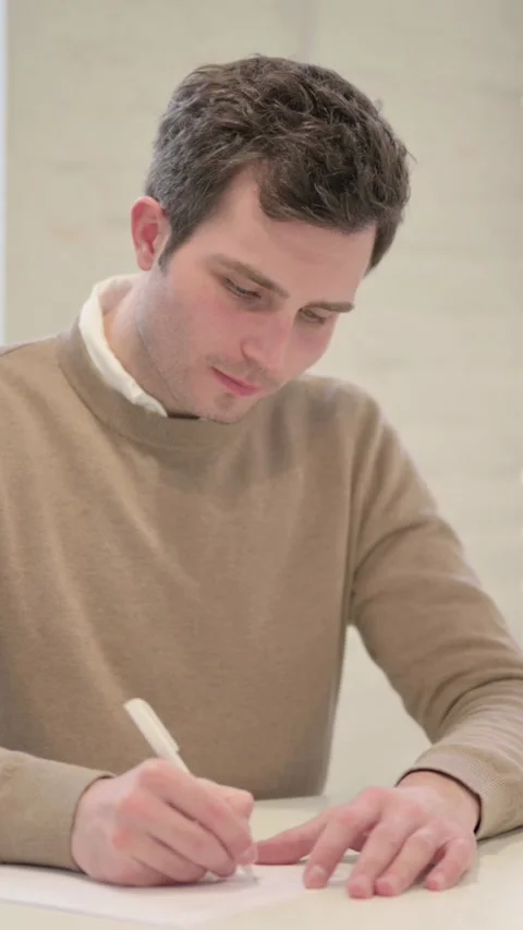 Man Writing on Paper in Office, Vertical Video Видео 337351403