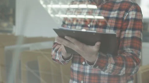 Man writing with pen in tablet at work.. Closeup of business man hand write Stock Footage 110794152
