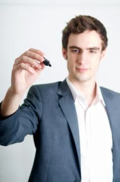 Man writing Stock Photos