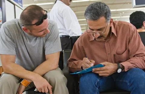 Man writing Stock Photos