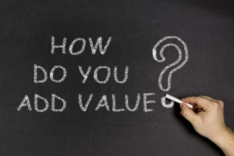 Man writing question HOW DO YOU ADD VALUE on blackboard, closeup 写真素材