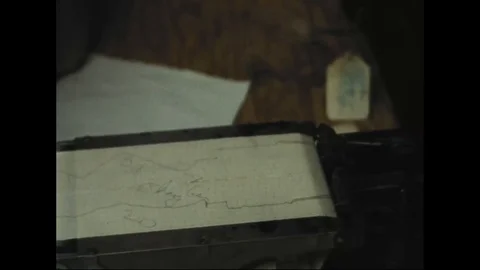 Man writing on readout chart in Laboratory - 1969 動画素材 104332307