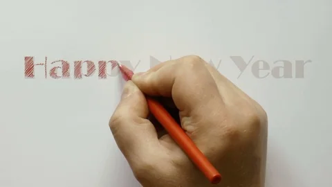 Man writing red pen with a happy new year Stock Footage 80719429