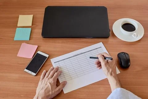 Man writing reminder Stock Photos