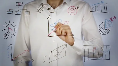 Man writing seo on transparent screen with increase graphic Stock Footage 81637357