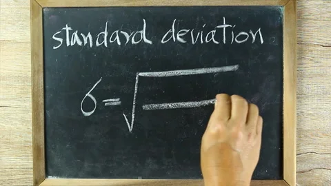 Man writing  Standard deviation formula on black board, in studio Chiangmai Thai Stock Footage 154202726