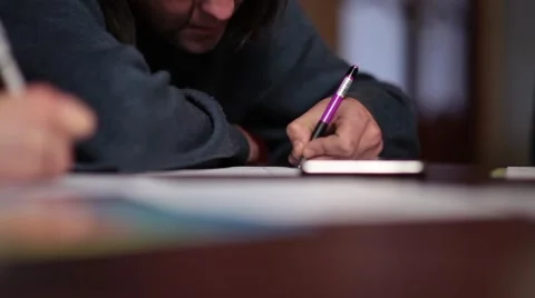 A man is writing text description Stock Footage 58395471