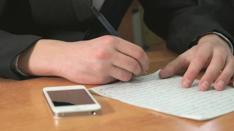 Man writing text using pen in document. Close-up Stock Footage 87768684