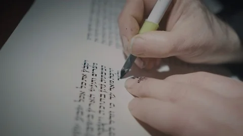 Man Writing a Torah scroll Stock Footage 105385284