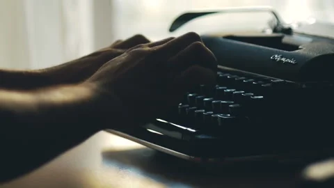 Man is Writing on Typewriter Stock Footage 159334667