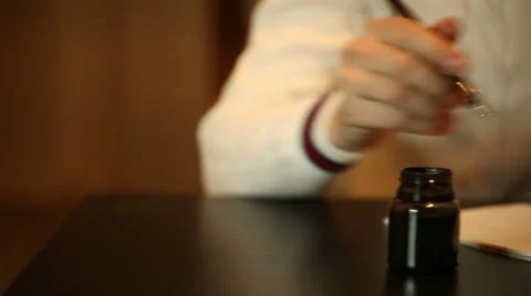 Man writining some text by pen Stock Footage 44302277