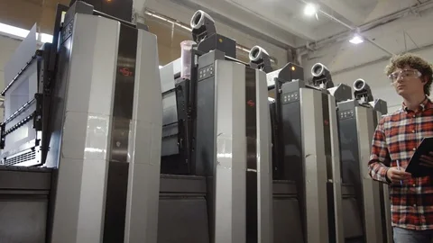 Man writting with pen in tablet at work. Closeup portrait of young coworker in Stock Footage 110795751