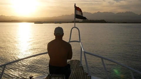 Man on a yacht on the sunset Stock Footage 89658318