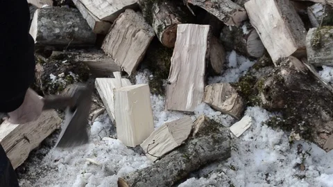 Man in the yard breaks wood Stock Footage 102697987