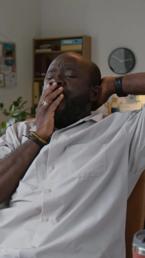 Man Yawning while Coding Stock Footage 317325690