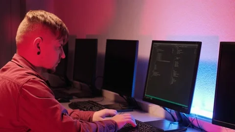 The man is a young programmer working in the office and is upset. Stock Footage 146991902