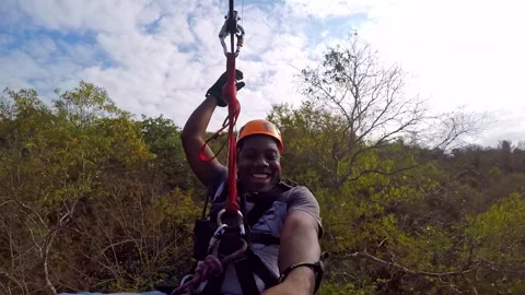 A man on a zip line Stock Footage 289190637