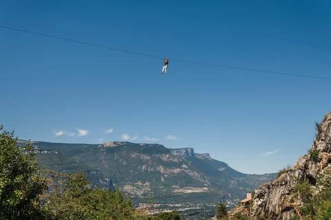 Man Zip Lining from Top of Bastille Stock Photos
