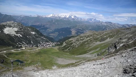 Man ziplining into Alpine scenery. Alps, France Stock Footage 248638245